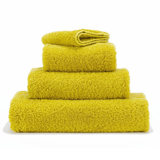 Luxusní ručník z egyptské bavlny ve svěžím citrusovém odstínu Yuzu Super Pile Abyss & Habidecor Waterfall Bathrooms