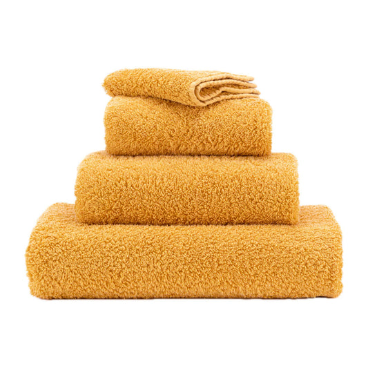 Luxusní sytě žlutý froté ručník s vysokou gramáží Super Pile Abyss & Habidecor Waterfall Bathrooms