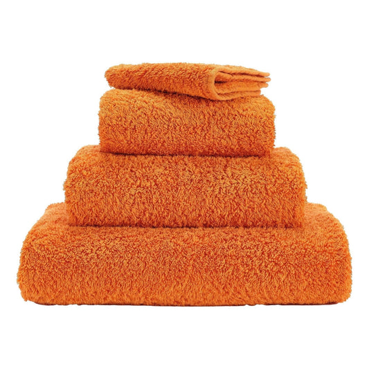 Luxusní ručník z egyptské bavlny v šťavnatém odstínu mandarinky Tangerine Super Pile Abyss & Habidecor Waterfall Bathrooms