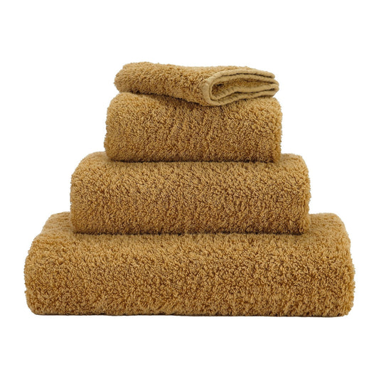 Luxusní ručník z egyptské bavlny v noblesním zlatém odstínu Gold Super Pile Abyss & Habidecor Waterfall Bathrooms